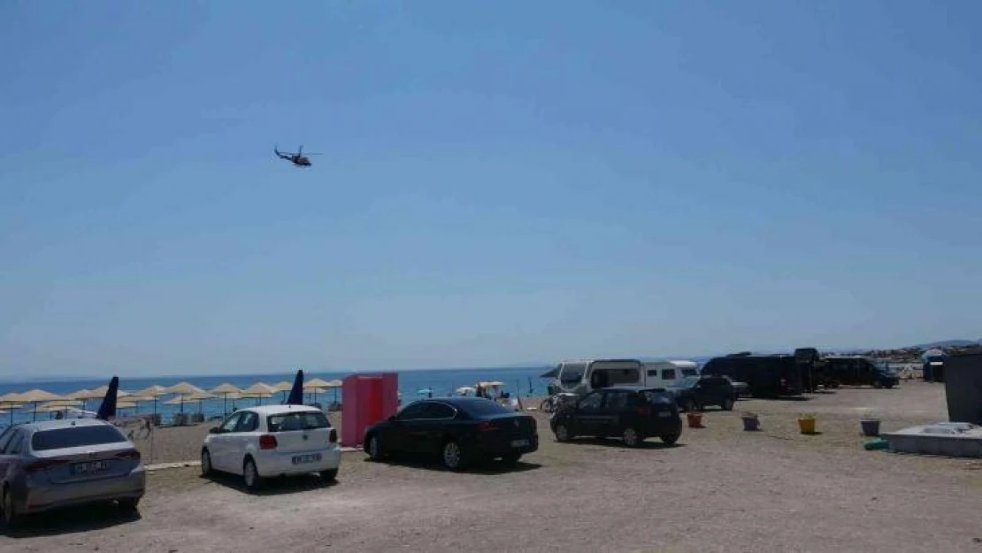 Çanakkale'de lastik botla denize açılan kişiyi arama çalışmaları sürüyor