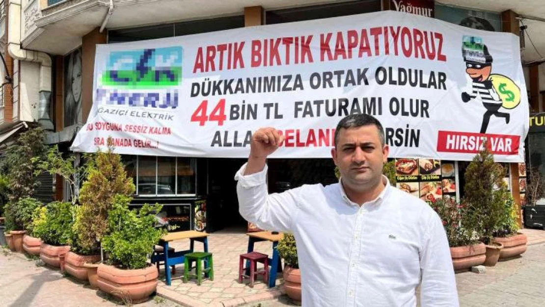 Elektrik faturasına kızdı, 'Hırsız var' diye pankart astı