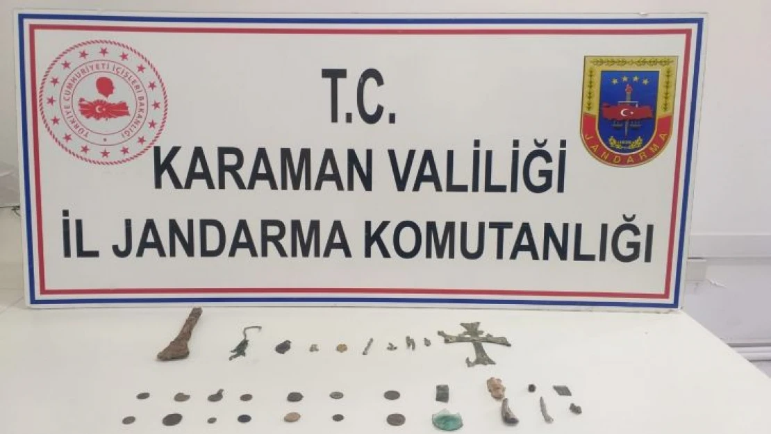 Karaman'da bir otomobilin bagajında tarihi eser ele geçirildi