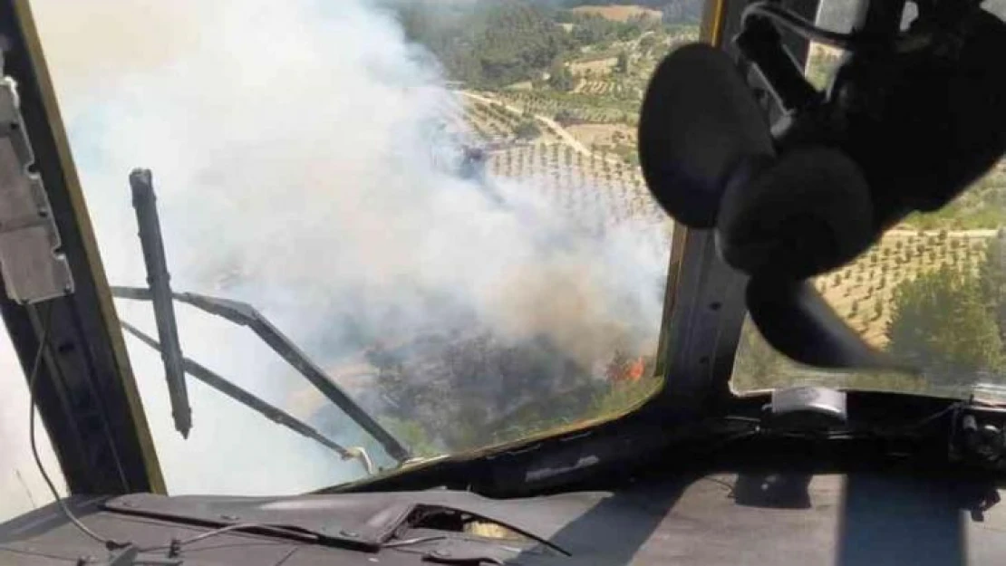 Manisa'daki orman yangınına 5 uçak ve 8 helikopter müdahale ediyor