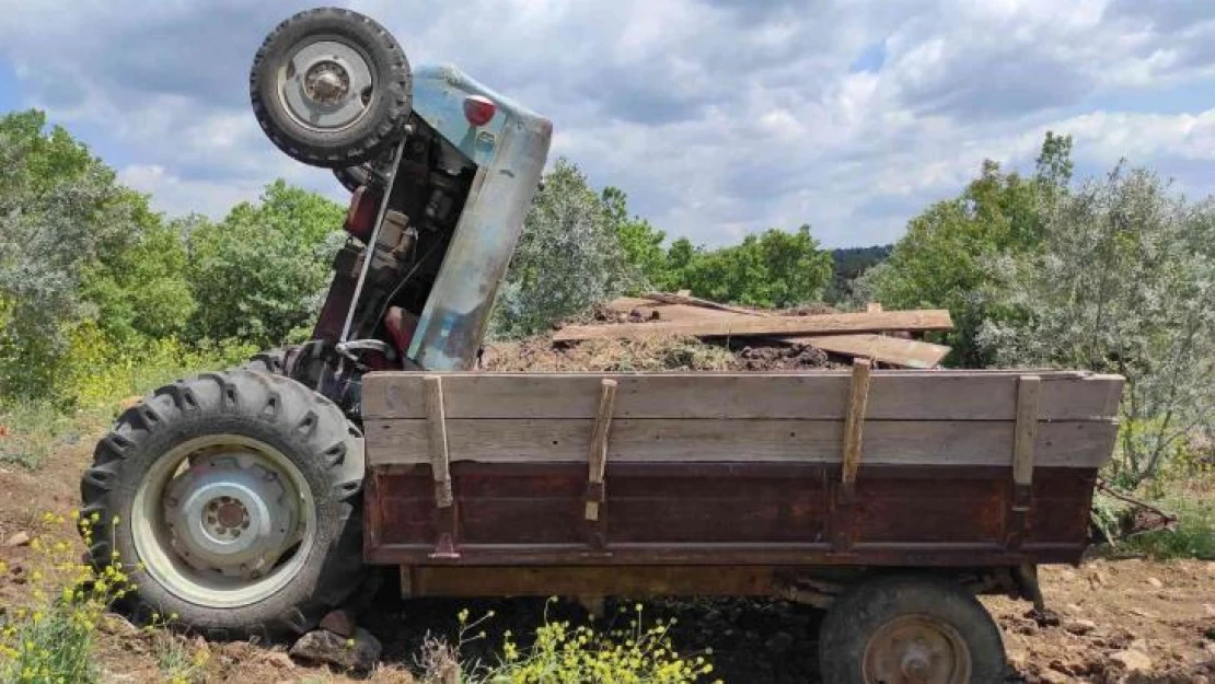 Traktörle römorku arasına sıkışan kadın yaralandı